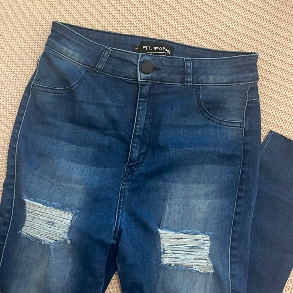 FIT Jeans size M. Have been cut for person who is 5’5 worn once